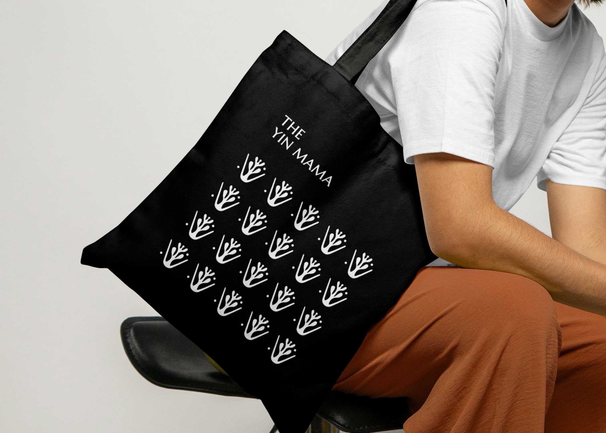 The Yin Mama tote bag with repeated mark pattern