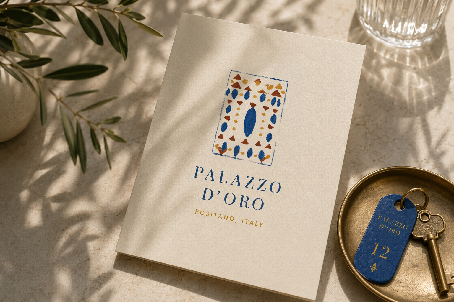Palazzo D'Oro printed cover with a numbered room key