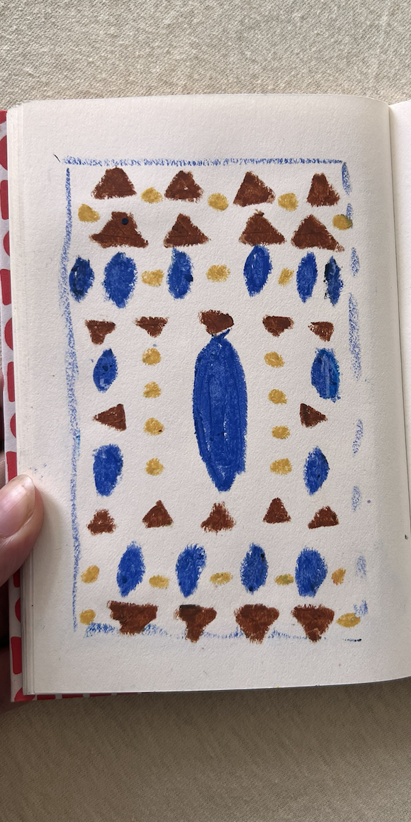 The original hand-painted study of the Palazzo D'Oro tile motif in a notebook